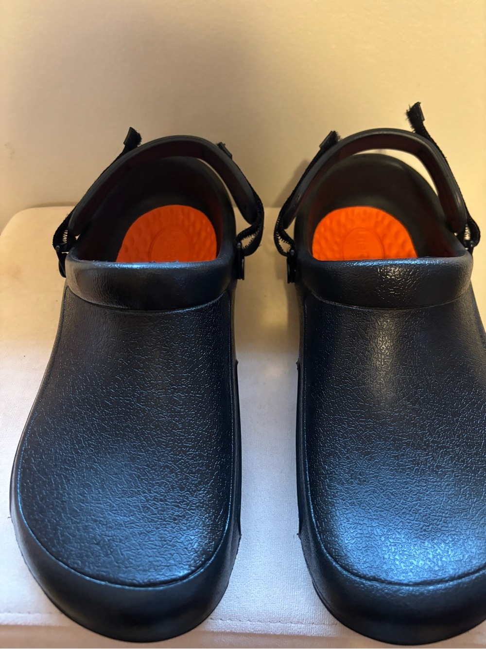 CROCS Unisex Black Clogs with Orange Insole Accent